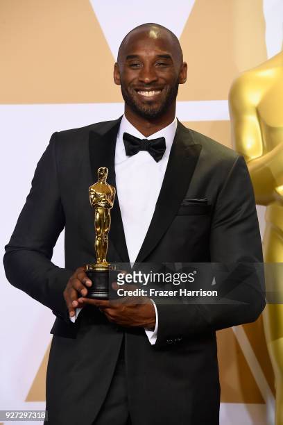 Filmmaker Kobe Bryant, winner of the Best Animated Short Film award for 'Dear Basketball,' poses in the press room during the 90th Annual Academy...