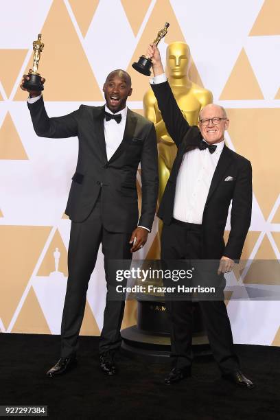 Filmmakers Kobe Bryant and Glen Keane, winners of the Best Animated Short Film award for 'Dear Basketball,' pose in the press room during the 90th...