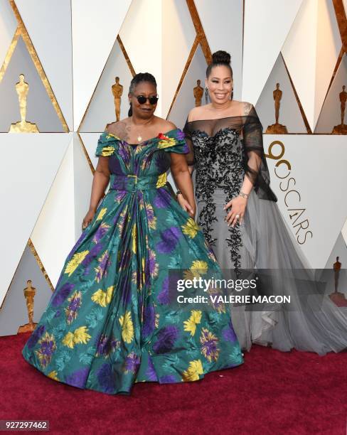 Actress Whoopi Goldberg and Alex Martin arrive for the 90th Annual Academy Awards on March 4 in Hollywood, California. / AFP PHOTO / VALERIE MACON