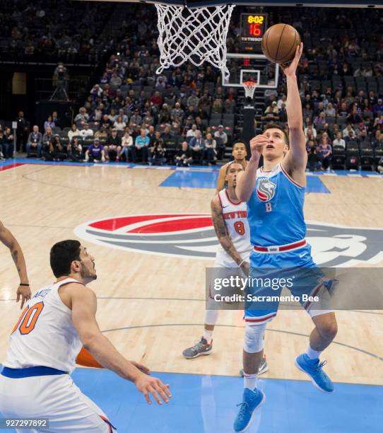 Sacramento Kings guard Bogdan Bogdanovic shoots against the New York Knicks on Sunday, March 4, 2018 at the Golden 1 Center in Sacramento, Calif.