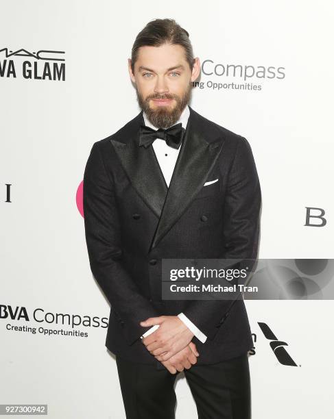 Tom Payne arrives to the 26th Annual Elton John AIDS Foundation's Academy Awards Viewing Party held at West Hollywood Park on March 4, 2018 in West...