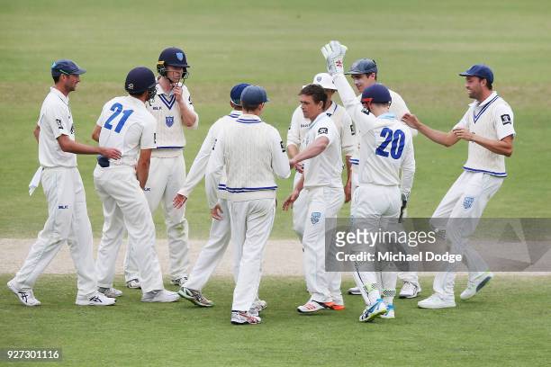 Steve O'Keefe celebrates a wicket during day three of the Sheffield Shield match between Victoria and New South Wales at Junction Oval on March 5,...