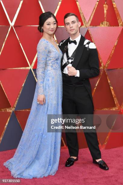 Mirai Nagasu and Adam Rippon attend the 90th Annual Academy Awards at Hollywood & Highland Center on March 4, 2018 in Hollywood, California.