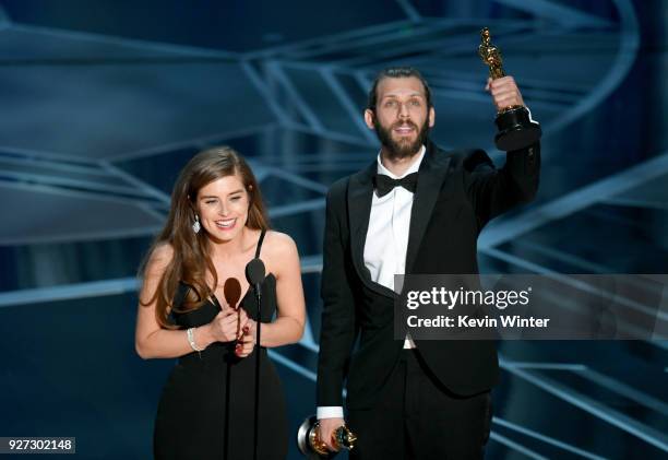 Filmmakers Rachel Shenton and Chris Overton accept Best Live Action Short Film for 'The Silent Child' onstage during the 90th Annual Academy Awards...