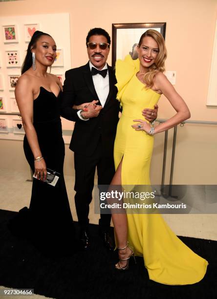 Lisa Parigi, Lionel Richie, and Petra Nemcova attends the 26th annual Elton John AIDS Foundation Academy Awards Viewing Party sponsored by Bulgari,...