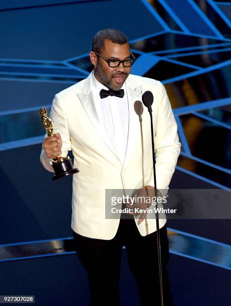 Writer/director Jordan Peele accepts Best Original Screenplay for 'Get Out' onstage during the 90th Annual Academy Awards at the Dolby Theatre at...