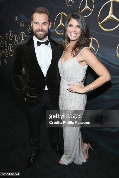 Actors Daniel MacPherson and Zoe Ventoura attend Mercedes-Benz USA Official Awards Viewing Party at Four Seasons, Beverly Hills, CA on March 4, 2018...