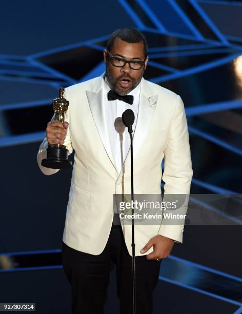 Writer/director Jordan Peele accepts Best Original Screenplay for 'Get Out' onstage during the 90th Annual Academy Awards at the Dolby Theatre at...