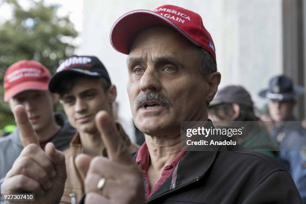 Supporters of Donald Trump rally in Oregon's state capital, Salem, on March 4, 2018.