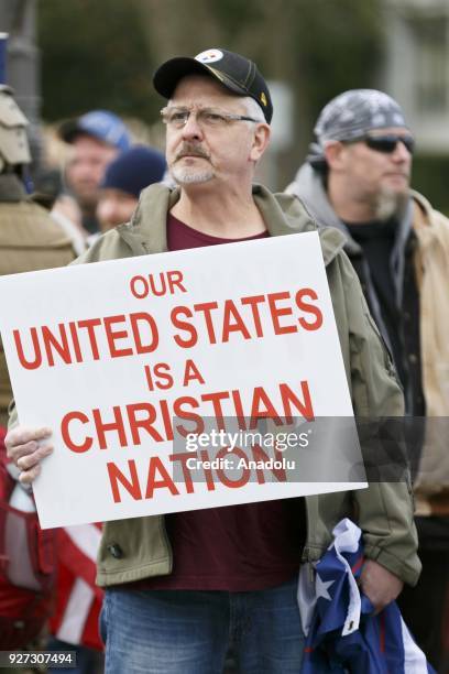 Supporters of Donald Trump rally in Oregon's state capital, Salem, on March 4, 2018.