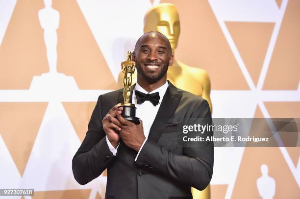 Filmmaker Kobe Bryant, winner of the Best Animated Short Film award for 'Dear Basketball,' poses in the press room during the 90th Annual Academy...