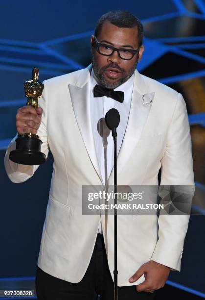 Director Jordan Peele delivers a speech after he won the Oscar for Best Original Screenplay for "Get Out" during the 90th Annual Academy Awards show...