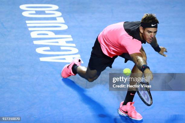 Juan Martin del Potro of Argentina returns a shot during the Championship match between Kevin Anderson of South Africa and Juan Martin del Potro of...