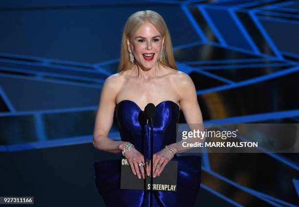 Australian actress Nicole Kidman presents the Oscar for Best Original Screenplay during the 90th Annual Academy Awards show on March 4, 2018 in...