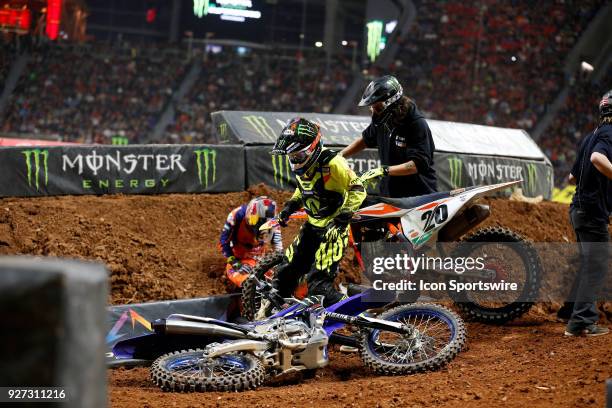 Monster Energy/Knich/Factory Yamaha 450cc rider Cooper Webb and Red Bull KTM 450cc rider Broc Tickle wreck in a corner of the Monster Energy AMA...