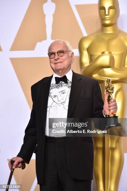 Writer James Ivory, winner of the Best Adapted Screenplay award for 'Call Me By Your Name,' poses in the press room during the 90th Annual Academy...