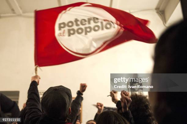 Party militants Power to the world within the former EX OGP social center during operation of counting ballot papers on March 4, 2018 in Caserta,...