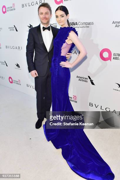 Chris Hardwick and Lydia Hearst attend the 26th annual Elton John AIDS Foundation Academy Awards Viewing Party sponsored by Bulgari, celebrating EJAF...