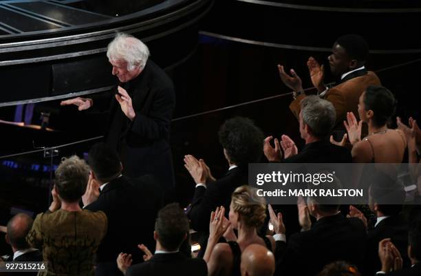 Cinematographer Roger A. Deakins reacts after he won the Oscar for Best Cinematography for "Blade Runner 2049" during the 90th Annual Academy Awards...