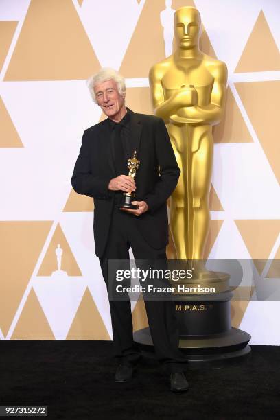 Cinematographer Roger Deakins, winner of the Best Cinematography award for 'Blade Runner 2049,' poses in the press room during the 90th Annual...