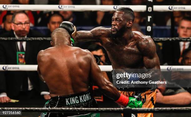 Luis Ortiz and Deontay Wilder fight during their WBC Heavyweight Championship fight at Barclays Center on March 3, 2018 in the Brooklyn Borough of...