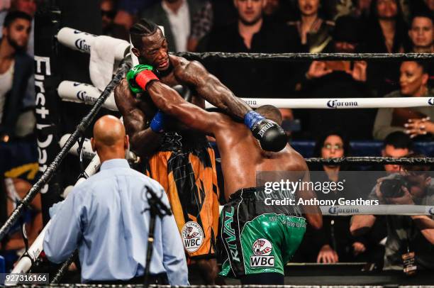 Luis Ortiz and Deontay Wilder fight during their WBC Heavyweight Championship fight at Barclays Center on March 3, 2018 in the Brooklyn Borough of...