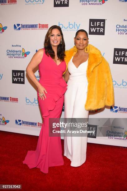 Alex Meneses and Garcelle Beauvais attend the Byron Allen's Oscar Gala Viewing Party to support the Children's Hospital Los Angeles at the Beverly...