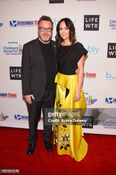 Tom Arnold and Ashley Groussman attend the Byron Allen's Oscar Gala Viewing Party to support the Children's Hospital Los Angeles at the Beverly...