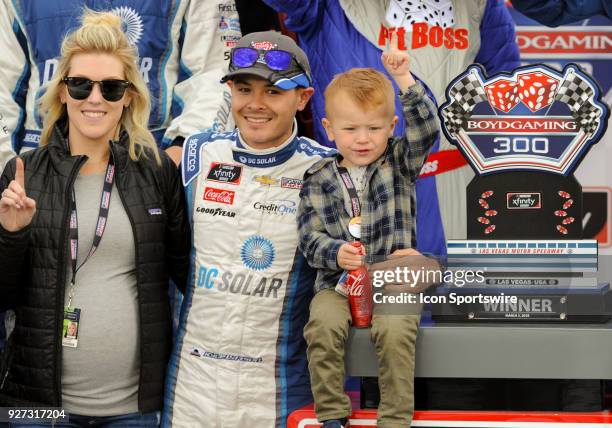 Xfinity Series driver Kyle Larson with his wife Katelyn Sweet and son Carson celebrate after the Xfinity Series- Boyd Gaming 300 race on March 2,...