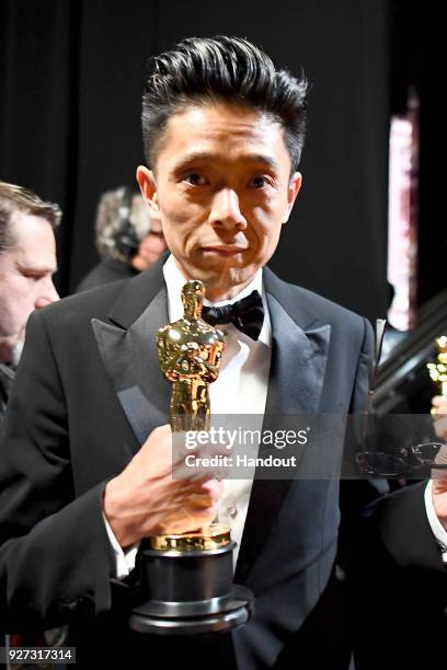 In this handout provided by A.M.P.A.S., Kazuhiro Tsuji winner Best Makeup and Hairstyling for 'Darkest Hour'attends the 90th Annual Academy Awards at...