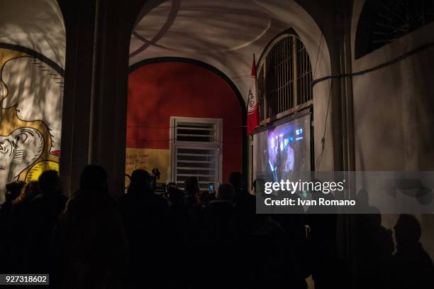 Party militants Power to the world within the former EX OGP social center during the counting of the paper ballots on March 4, 2018 in Naples, Italy....