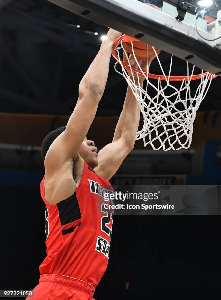 Illinois State guard William Tinsley dunks the ball during a Missouri Valley Conference Basketball Tournament game between Loyola Ramblers and...