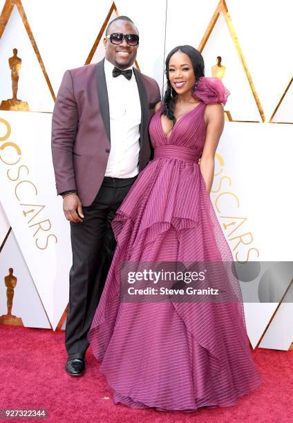 And DJ Kiss attends the 90th Annual Academy Awards at Hollywood & Highland Center on March 4, 2018 in Hollywood, California.