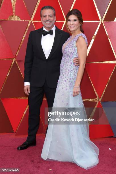 Michael De Luca and Angelique Madrid attend the 90th Annual Academy Awards at Hollywood & Highland Center on March 4, 2018 in Hollywood, California.