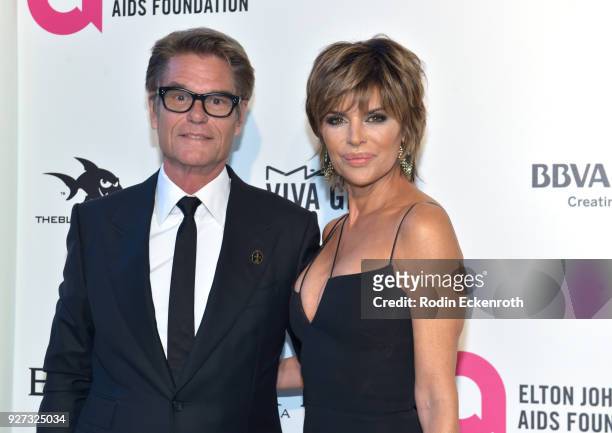 Harry Hamlin and Lisa Rinna attend the 26th annual Elton John AIDS Foundation's Academy Awards Viewing Party at The City of West Hollywood Park on...