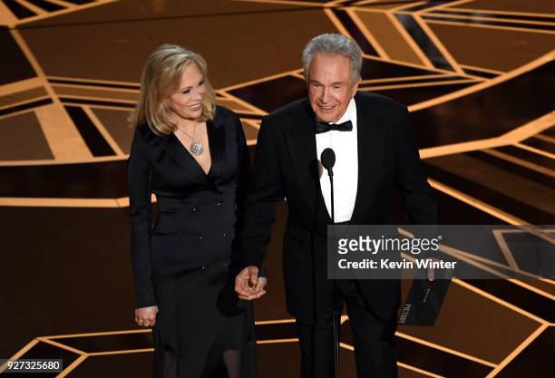 Actors Faye Dunaway and Warren Beatty speak onstage during the 90th Annual Academy Awards at the Dolby Theatre at Hollywood & Highland Center on...