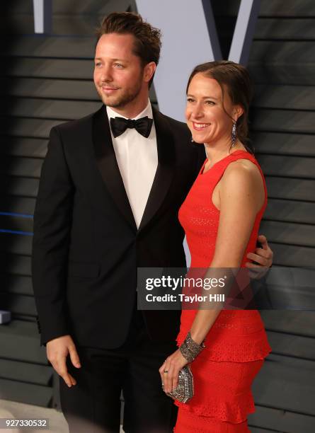 Writer Derek Blasberg and CEO of 23andMe Anne Wojcicki attend the 2018 Vanity Fair Oscar Party hosted by Radhika Jones at Wallis Annenberg Center for...