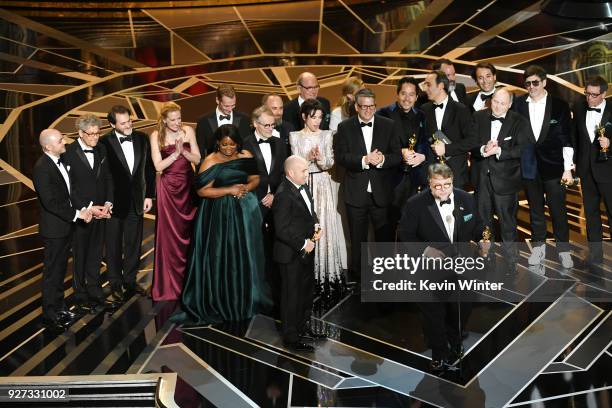 Producer J. Miles Dale , director Guillermo del Toro and cast/crew accept Best Picture for 'The Shape of Water' onstage during the 90th Annual...