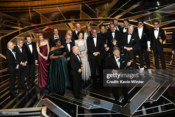 Producer J. Miles Dale , director Guillermo del Toro and cast/crew accept Best Picture for 'The Shape of Water' onstage during the 90th Annual...