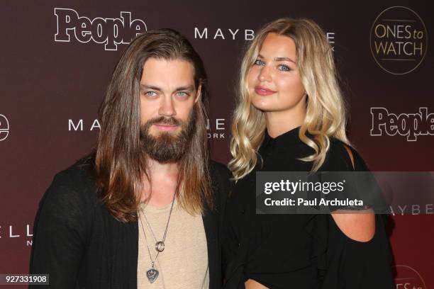 Actor Tom Payne and Model Jennifer Akerman attend People's 'Ones To Watch' party at NeueHouse Hollywood on October 4, 2017 in Los Angeles, California.
