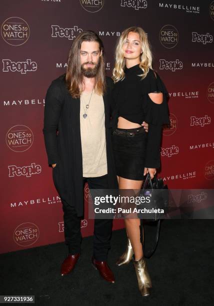 Actor Tom Payne and Model Jennifer Akerman attend People's 'Ones To Watch' party at NeueHouse Hollywood on October 4, 2017 in Los Angeles, California.