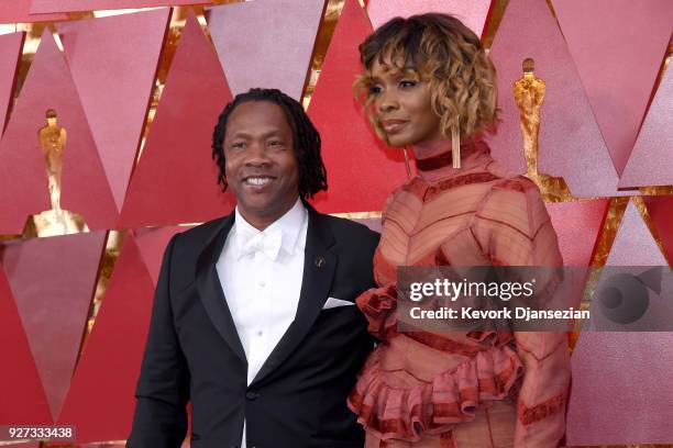 Roger Ross Williams and guest attend the 90th Annual Academy Awards at Hollywood & Highland Center on March 4, 2018 in Hollywood, California.