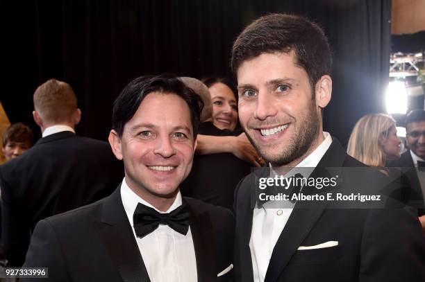 Scott Neustadter and Michael H. Weber attend the 90th Annual Academy Awards at Hollywood & Highland Center on March 4, 2018 in Hollywood, California.