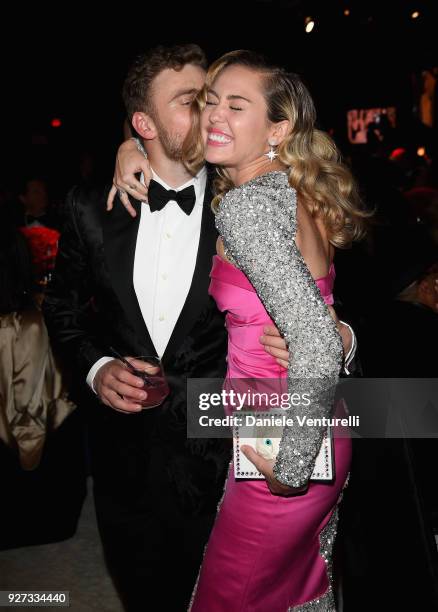 Gus Kenworthy and Miley Cyrus attend Elton John AIDS Foundation 26th Annual Academy Awards Viewing Party at The City of West Hollywood Park on March...