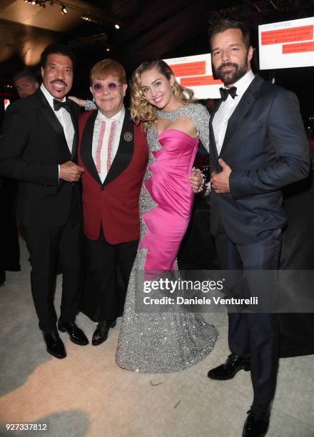 Lionel Richie, Sir Elton John, Miley Cyrus, and Ricky Martin attend Elton John AIDS Foundation 26th Annual Academy Awards Viewing Party at The City...