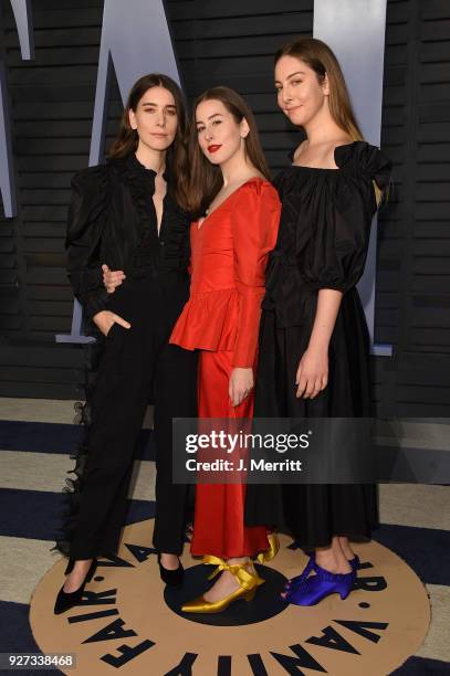 Danielle Haim, Este Haim and Alana Haim of Haim attend the 2018 Vanity Fair Oscar Party hosted by Radhika Jones at the Wallis Annenberg Center for...