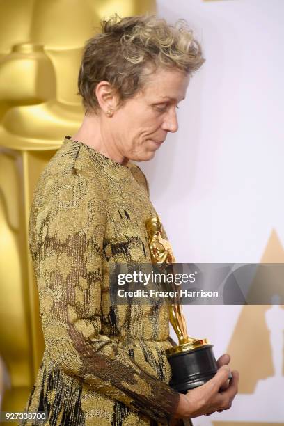 Actor Frances McDormand, winner of the Best Actress award for 'Three Billboards Outside Ebbing, Missouri,' poses in the press room during the 90th...