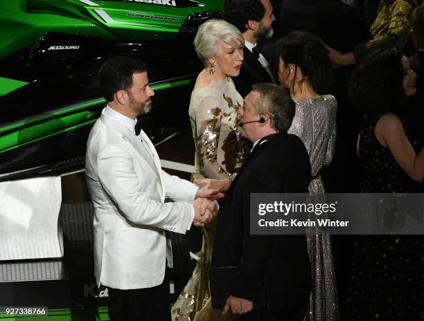 Host Jimmy Kimmel, actors Helen Mirren and Sally Hawkins speak onstage during the 90th Annual Academy Awards at the Dolby Theatre at Hollywood &...