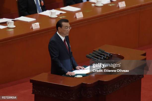 Chinese Premier Li Keqiang delivers a speech during the opening of the 13th National People's Congress at The Great Hall of People on March 5, 2018...