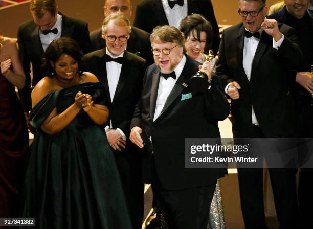 Director Guillermo del Toro holds the Best Picture award for 'The Shape of Water' with actors Octavia Spencer and Sally Hawkins onstage during the...